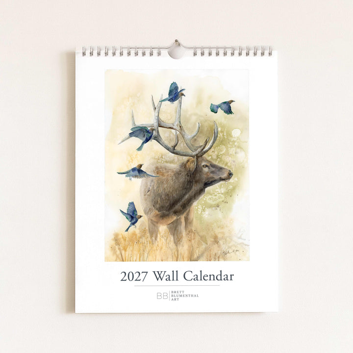 2027 wildlife watercolor calendar cover featuring an elk with cowbirds, one of 13 frame-ready prints by Brett Blumenthal