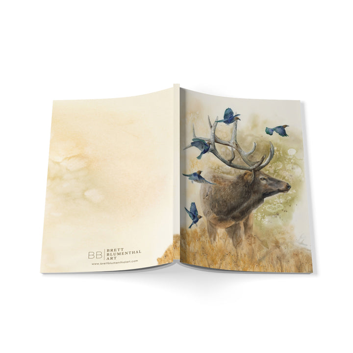 An Elk Journal Open laying face down