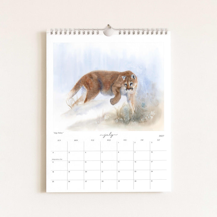 Watercolor painting of a mountain lion titled "Edge Walker," featured in the 2027 wildlife calendar