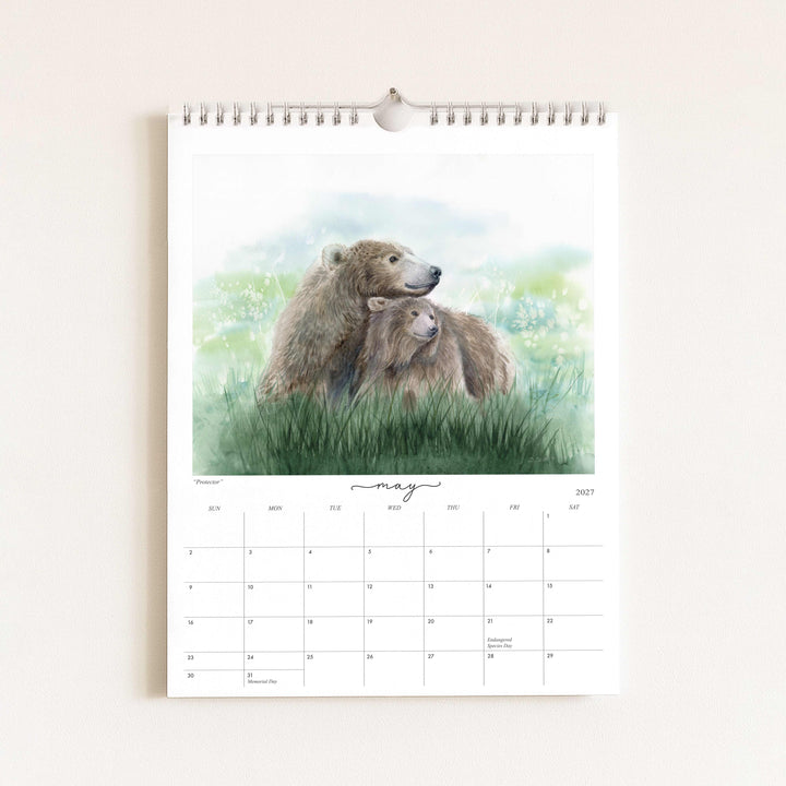 Watercolor painting of brown bears titled "Protector," featured in the 2027 wildlife calendar